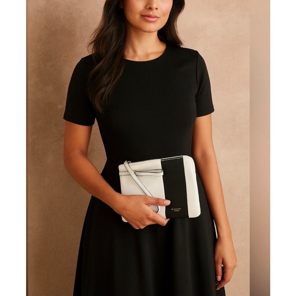 Isaac Mizrahi whit with black stripe clutch